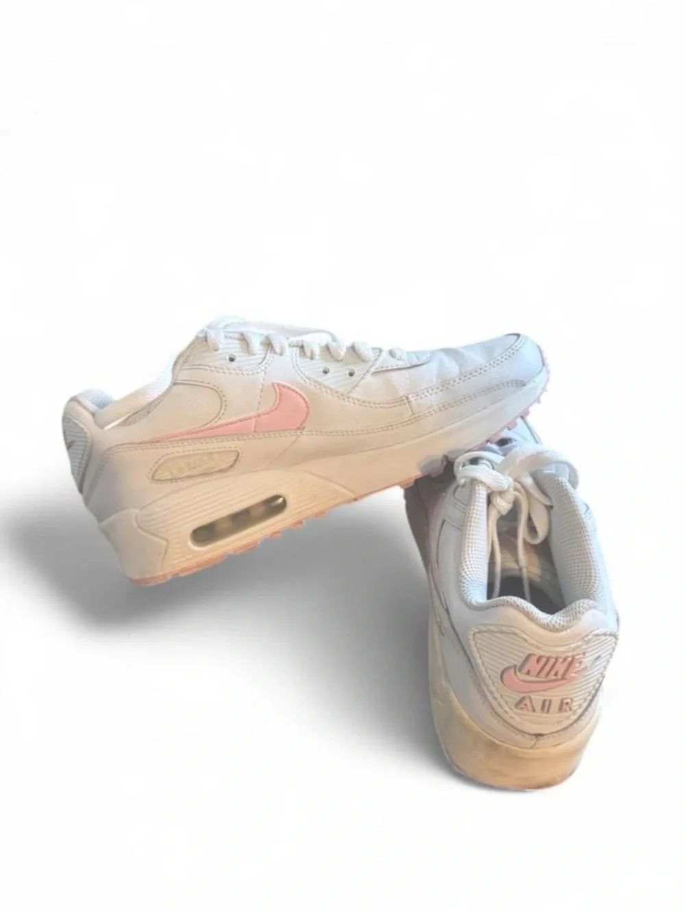 Nike Girl’s White Sneakers with Pink Swoosh Accent